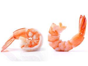 Plump, white shrimp with head shells removed. The cooked Tiger Shrimp have a beautiful orange speckling when removed from their red shell.